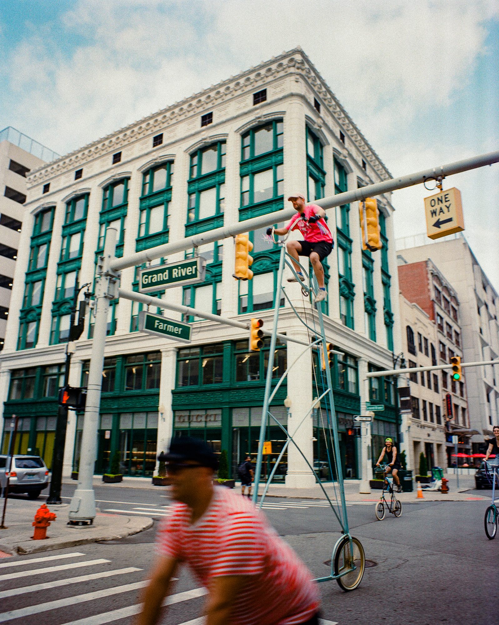 Grand River street corner with a historic building under open sky